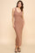 woman wearing a brown sleeveless maxi dress with a fitted silhouette and side slit