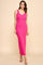 woman wearing a pink sleeveless maxi dress with a scoop neckline and a fitted silhouette