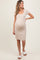 woman wearing a beige maternity dress with short sleeves and a bow detail, showing her baby bump