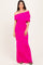 woman wearing a bright pink off-the-shoulder maxi dress with ruched details