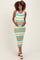 woman wearing a striped ribbed maternity dress in turquoise, orange, and white, holding her baby bump