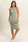 woman wearing a fitted olive green ribbed midi dress with a sleeveless design