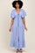 woman wearing a light purple tiered maxi dress with short flutter sleeves and a tie detailing at the neckline