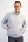woman wearing a light gray quarter-zip sweatshirt with side pockets and ribbed hem and cuffs