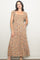 woman wearing a floral maxi dress with short ruffled sleeves and a square neckline