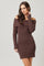 woman wearing a brown off-the-shoulder ribbed sweater dress with long sleeves and a fitted silhouette