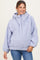 woman wearing a lavender maternity pullover hoodie with a cozy fleece texture and a front pocket