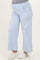 maternity wear light blue wide-leg pants with front pockets, worn by a model highlighting her baby bump
