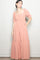 woman wearing a pink puff sleeve maxi dress with a square neckline and tiered skirt