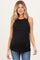 woman wearing a black maternity tank top, showing her baby bump, paired with blue jeans