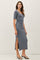 woman wearing a gray ribbed midi dress with a side slit and short sleeves