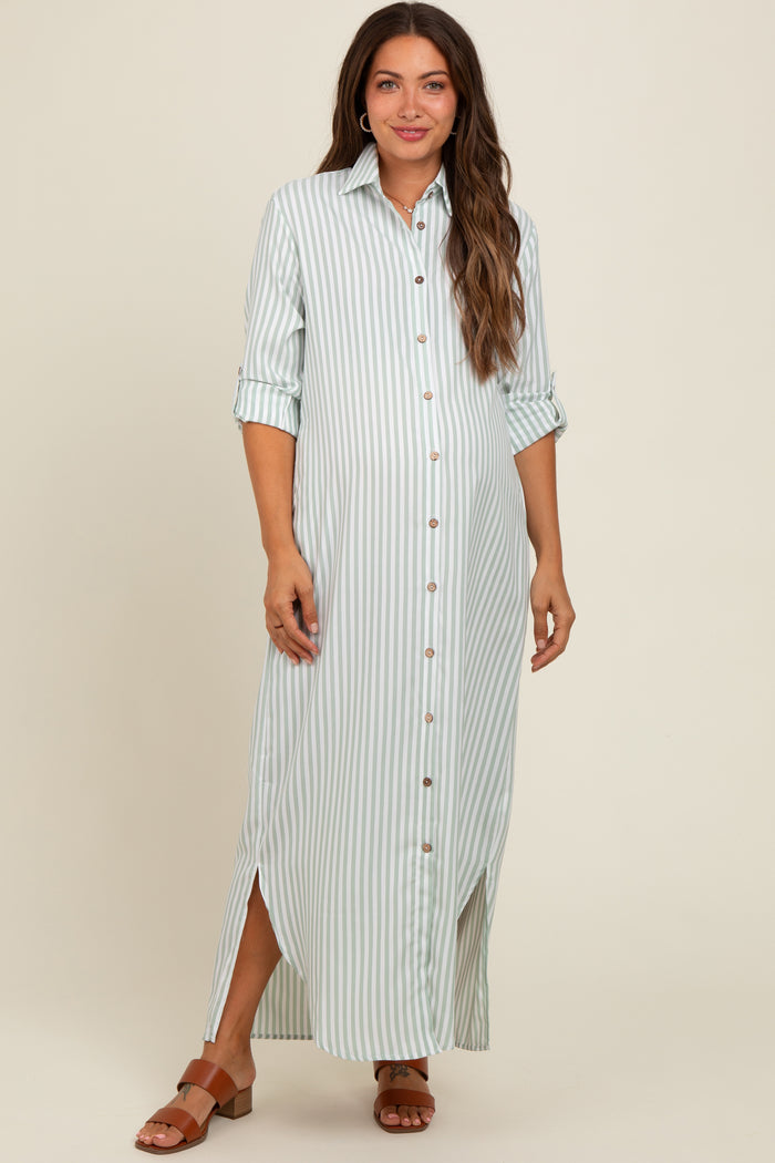 woman wearing a light green and white striped maternity dress with a button-up front and side slits, showcasing her baby bump