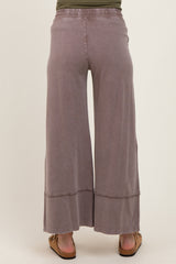 maternity wear lavender wide leg pants with a relaxed fit and elastic waistband, model shown from the back