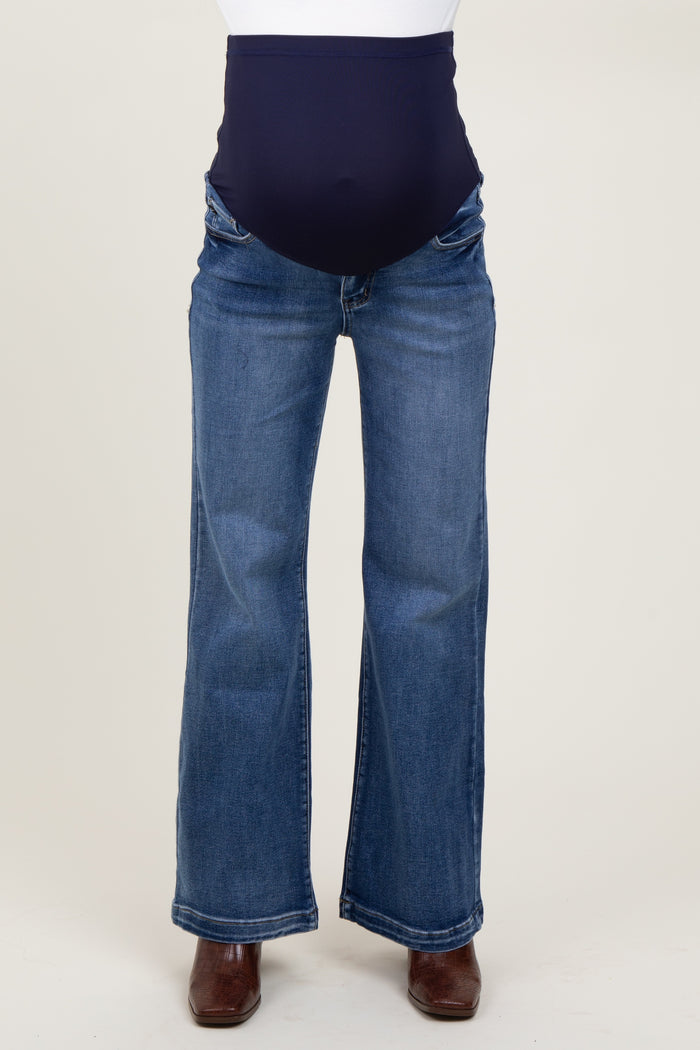 maternity wear dark blue flare jeans with a high waistband designed for comfort during pregnancy