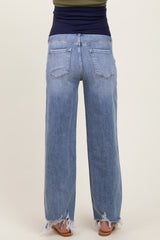 woman wearing light blue maternity wide-leg jeans with frayed hems, showing the back view