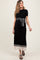 woman wearing a black ribbed maternity dress with a tied waist and cream striped hem, showcasing her baby bump