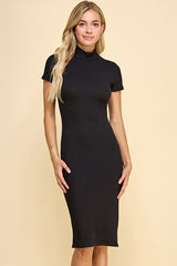 woman wearing a fitted black ribbed midi dress with short sleeves and a high neckline
