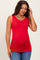 woman wearing a red maternity tank top and showing her baby bump