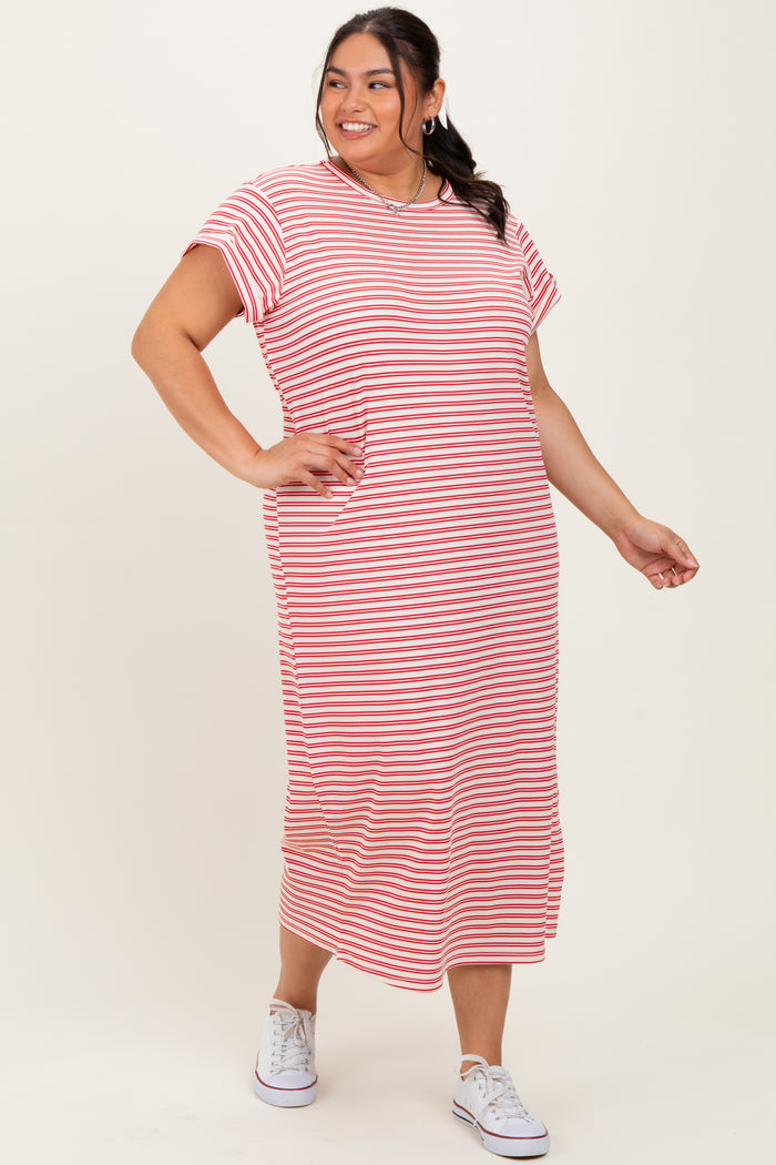woman wearing a striped red and white plus size maxi dress with short sleeves and pockets, paired with white sneakers