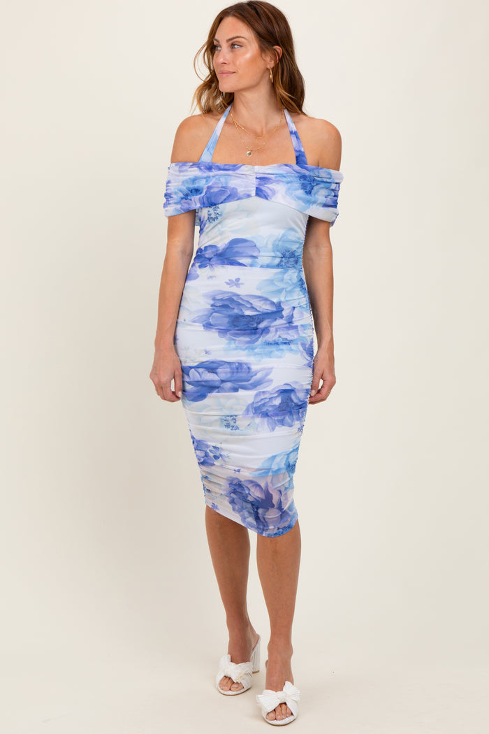 woman wearing a light blue off-the-shoulder floral bodycon dress with a fitted silhouette