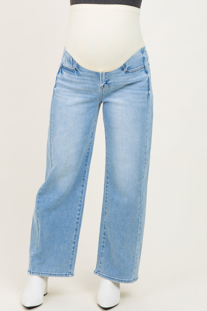 maternity wear light blue wide leg jeans with a stretchy over-the-bump waistband