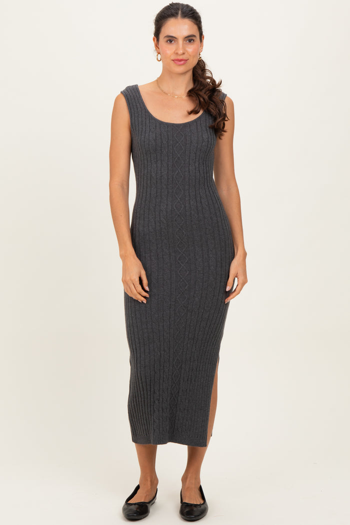 woman wearing a charcoal grey ribbed knit tank dress with side slits and a form-fitting silhouette
