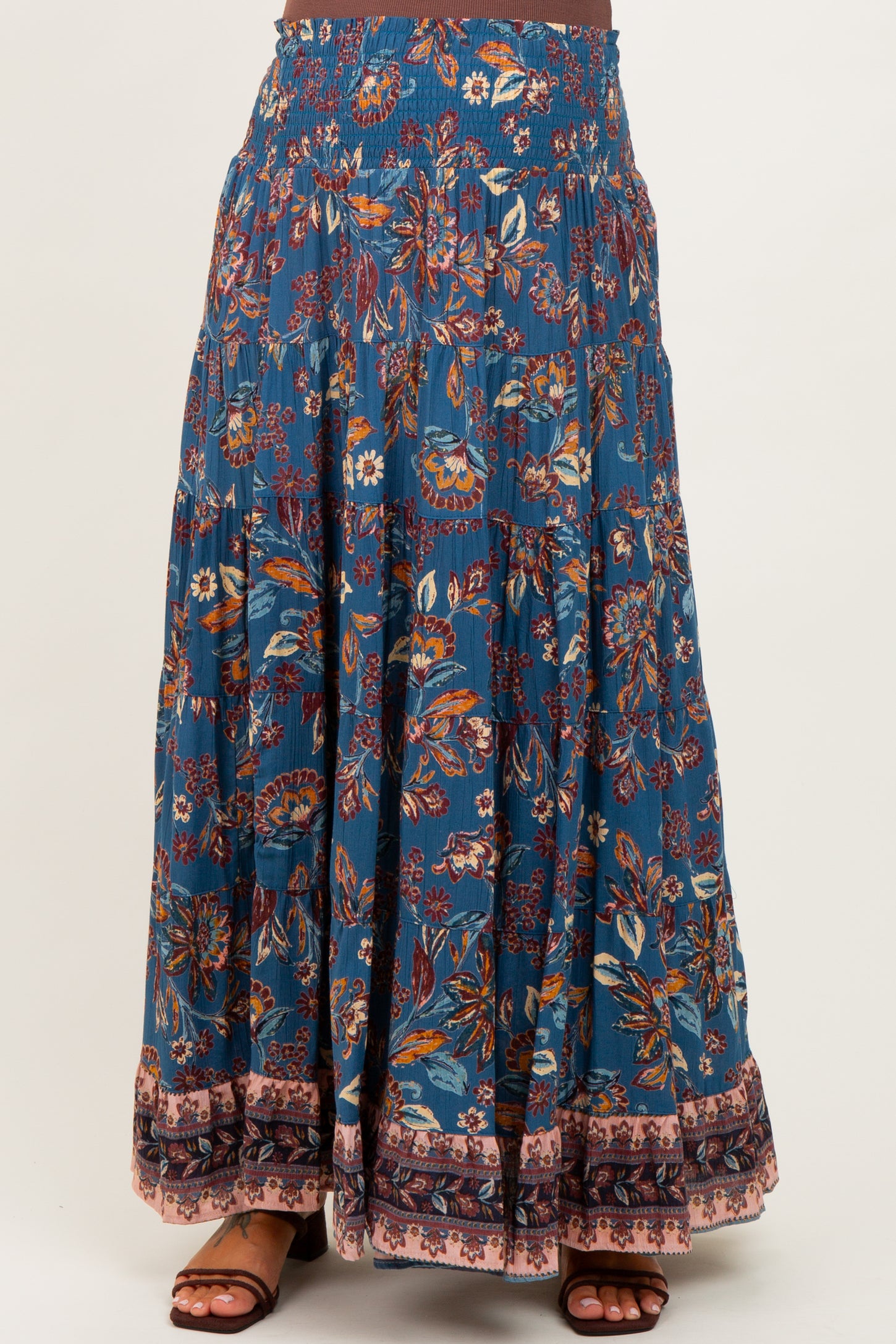 maternity wear women’s flowy blue floral maxi skirt with a smocked waistband and tiered design