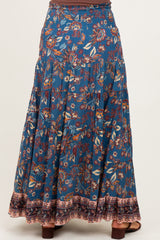 maternity wear blue floral maxi skirt with smocked waist and tiered design, back view, model not visible