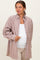 woman wearing a brown striped maternity button-up shirt with a white tank underneath and a visible baby bump