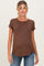 woman wearing a brown short sleeve maternity top and showing her baby bump