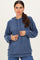 woman wearing a dark blue ribbed hoodie with a drawstring and a relaxed fit