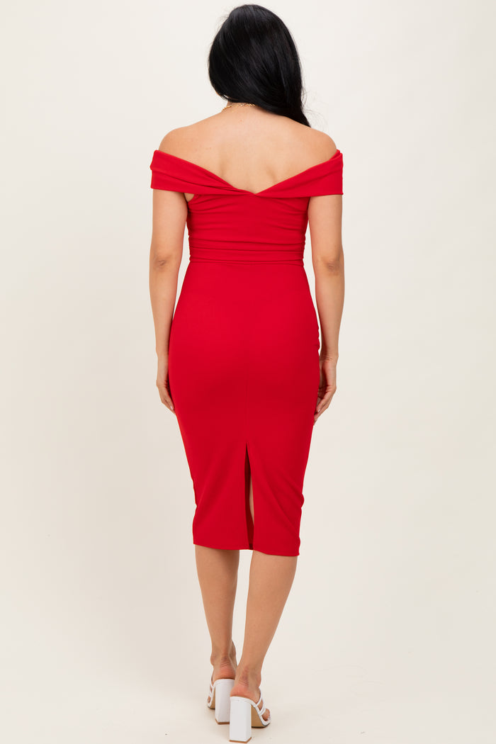 woman wearing a red off-the-shoulder midi dress with a back slit
