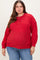 woman wearing a red maternity plus henley sweater with long sleeves and button details