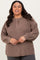 woman wearing a brown ribbed plus size long sleeve top with button details and balloon sleeves