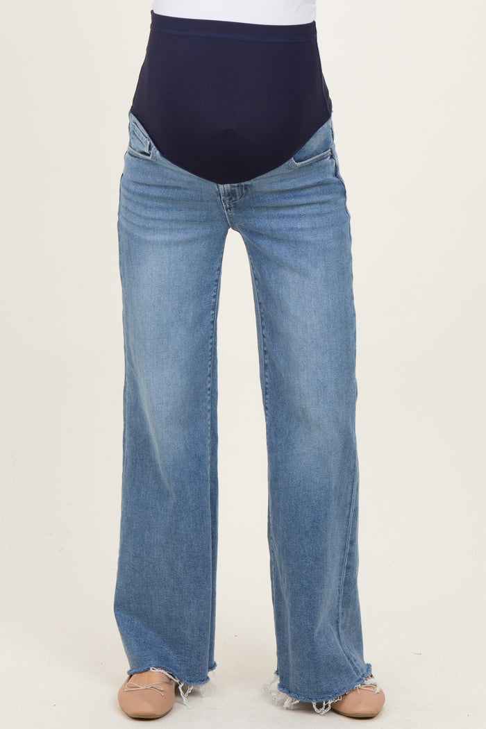 maternity wear light wash wide leg jeans with a stretchy navy over-the-bump waistband
