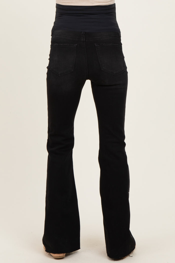 black maternity flared jeans featuring a stretchy waistband for comfort and support