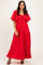 woman wearing a red tiered maxi dress with flutter sleeves and a tie front detail