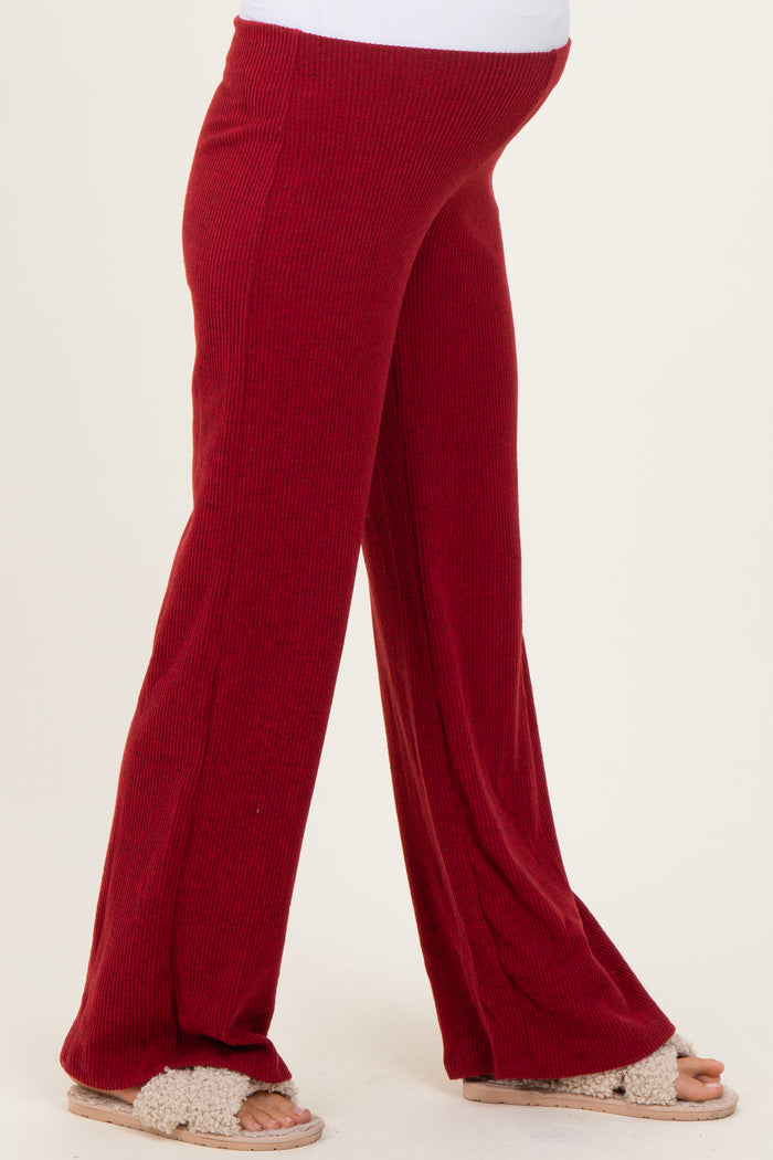 maternity wear red ribbed flare pants with a comfy fit and an elastic waistband, perfect for expecting mothers