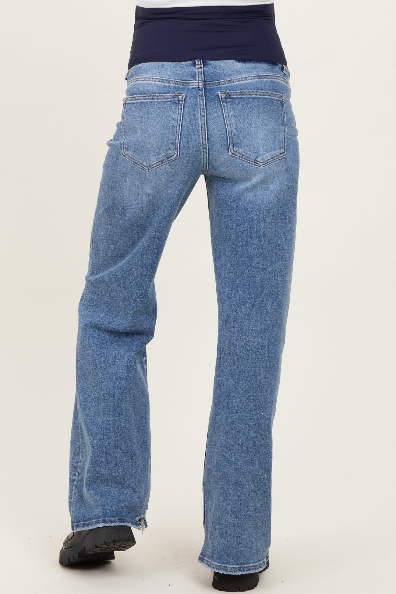 maternity wear blue denim straight leg jeans with a comfortable waistband, seen from the back