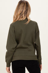 woman wearing an olive green maternity sweatshirt with a relaxed fit and ribbed hem, view from the back