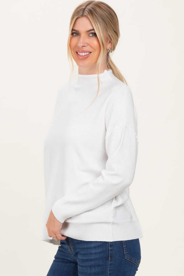 Ivory Mock Neck Exposed Seam Sweater