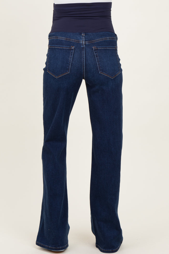 maternity wear dark blue flared jeans with a stretchy navy waistband, shown from the back