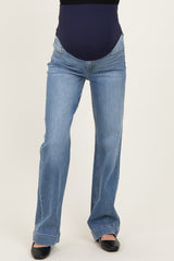 maternity wear blue bootcut jeans with a navy belly support panel, styled with a comfortable fit