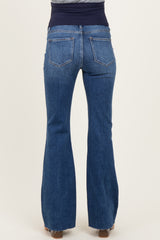 maternity wear blue flared jeans with a stretchy navy waistband, showing the back view