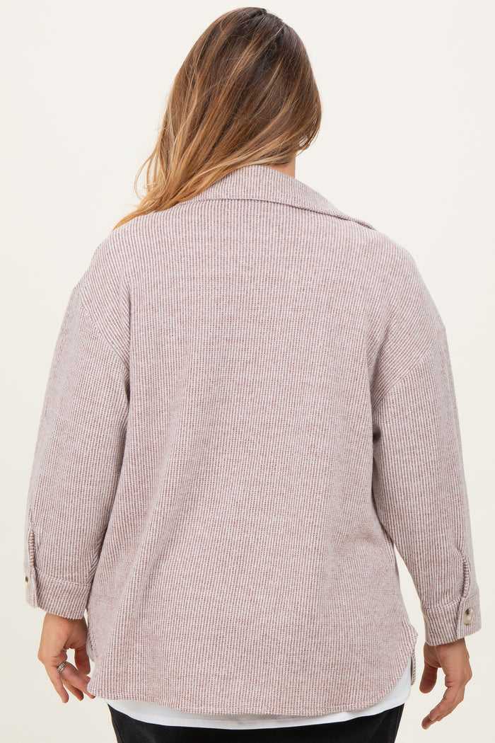 plus size woman wearing a light pink striped maternity sweater with a relaxed fit and buttoned cuffs, viewed from the back