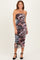 woman wearing a strapless fitted floral midi dress with ruching and a straight neckline