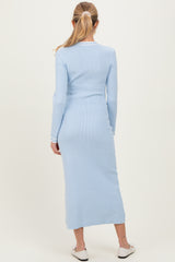 woman wearing a light blue long sleeve ribbed maternity dress from the back