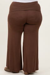woman wearing brown plus size wide-leg pants, showing back view and comfortable waistband