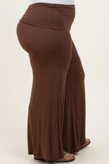 woman wearing brown plus size wide leg pants with an elastic waistband