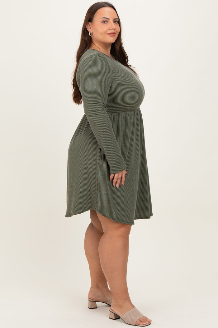 woman wearing a long sleeve olive green ribbed dress with a flared skirt and side pockets